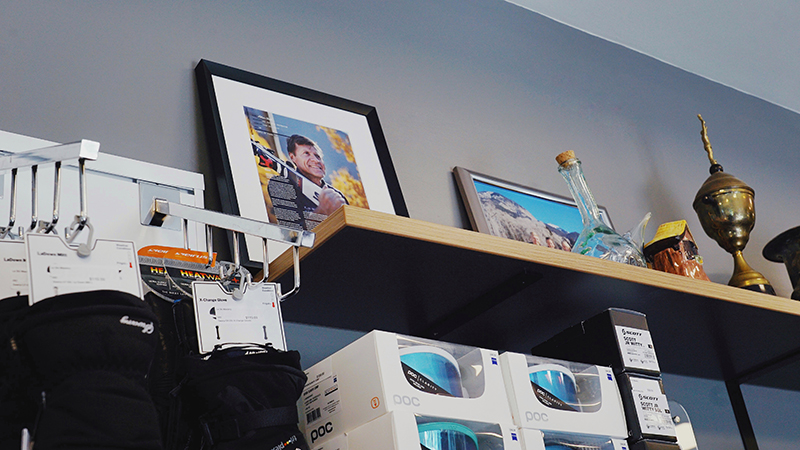 Photograph of a skier and awards on a shelf
