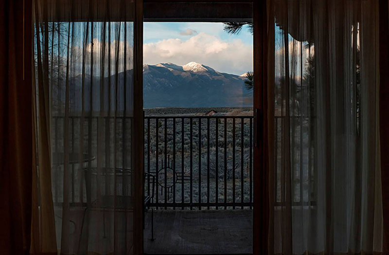 A mountain view from a hotel room.