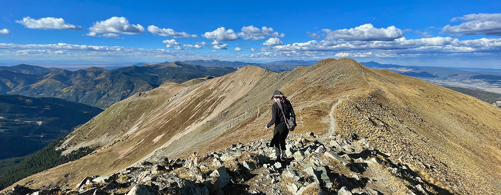 Hiker descending Wheeler Peak in New Mexico