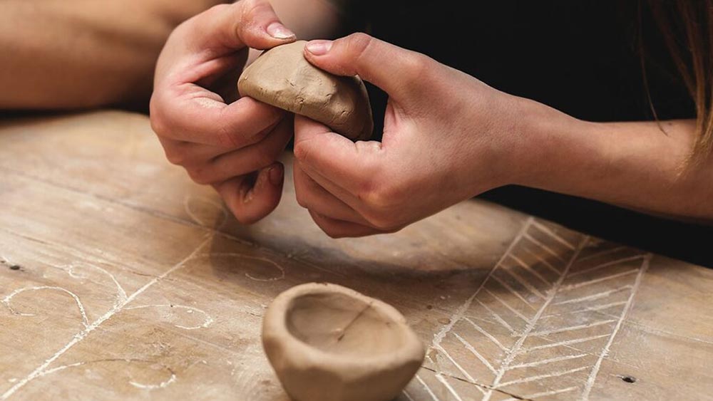 Air dry pinch pot workshop.