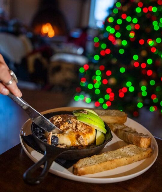 Baked brie with focaccia by the fireplace at the 192 in Taos Ski Valley.