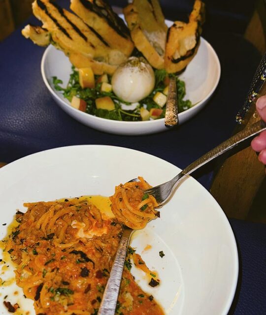 Lamb ragout Bucatini and Stracciatella salad and grilled bread.