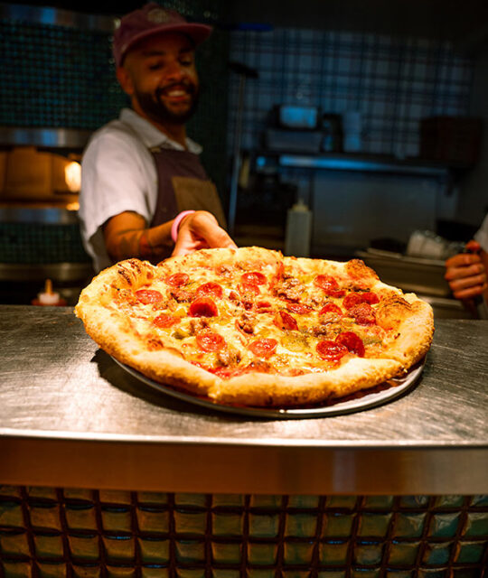 Pepperoni pizza fresh out of the oven.