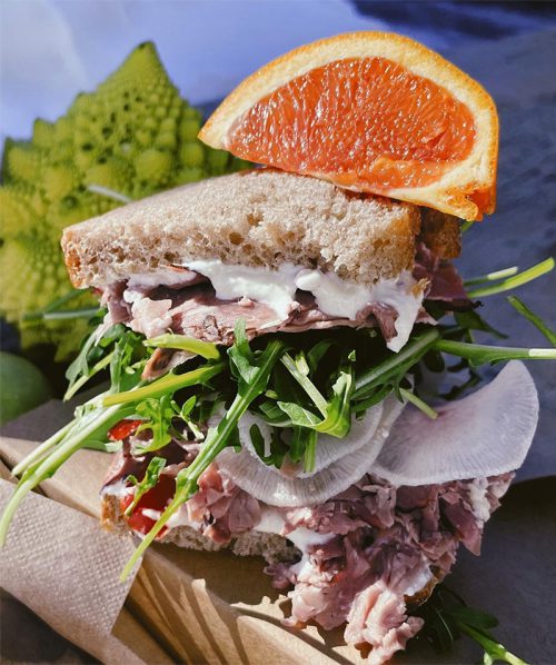 Tuna sandwich with greens and an orange slice from Der Garten in Taos Ski Valley