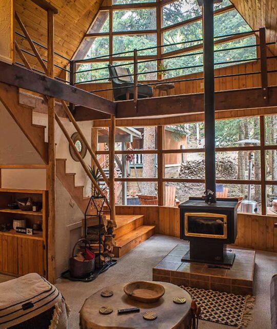 A-frame mountain cabin vacation rental living area.