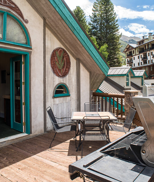 Vacation rental deck and BBQ at Alpine Village Suites
