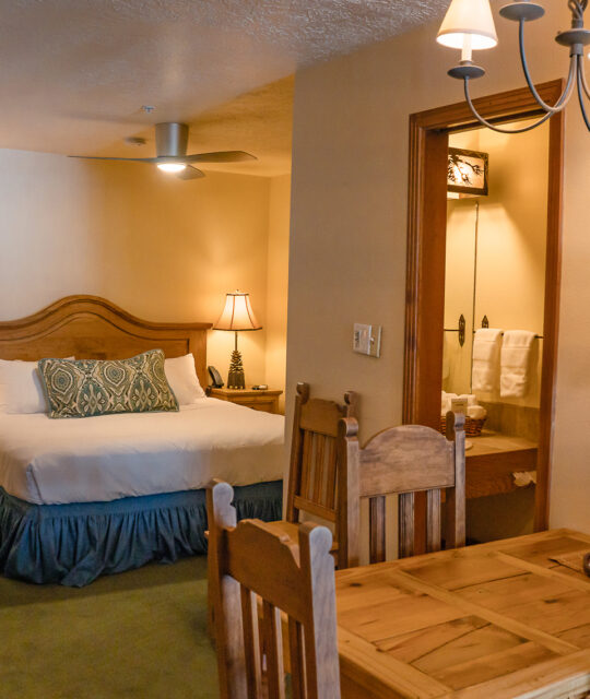 King bed hotel room at ski resort.
