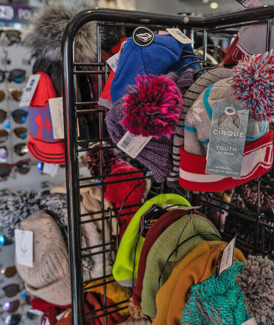 Knit hat display in a ski shop.