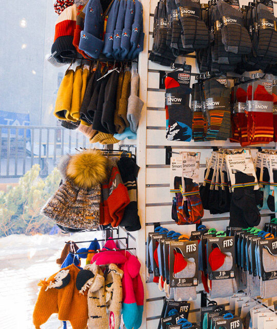 Knit hat display in a ski shop.