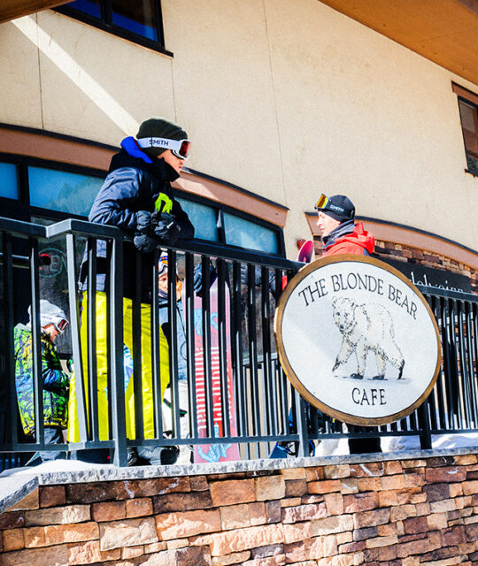 Skiers outside of The Blonde Bear Cafe.