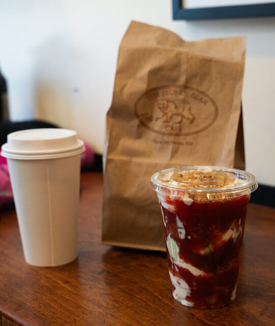 Parfait, coffee, and bagel to go.