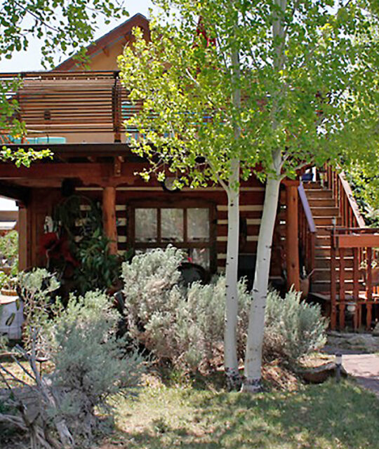 Vacation rental home with aspen trees in yard Arroyo Seco