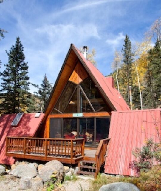 Mountain A-frame cabin in the woods