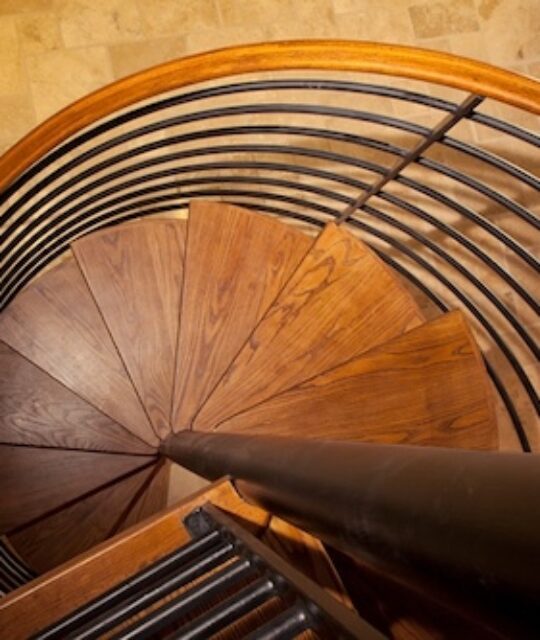 Wood spiral staircase birdseye view.