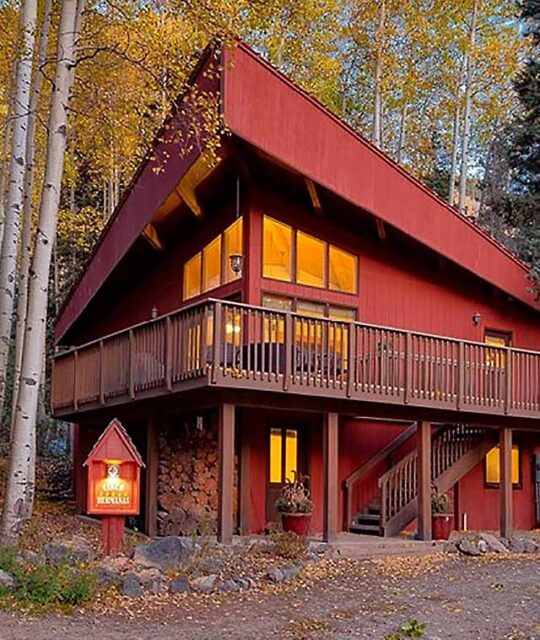 Vacation rental cabin exterior with fall colors