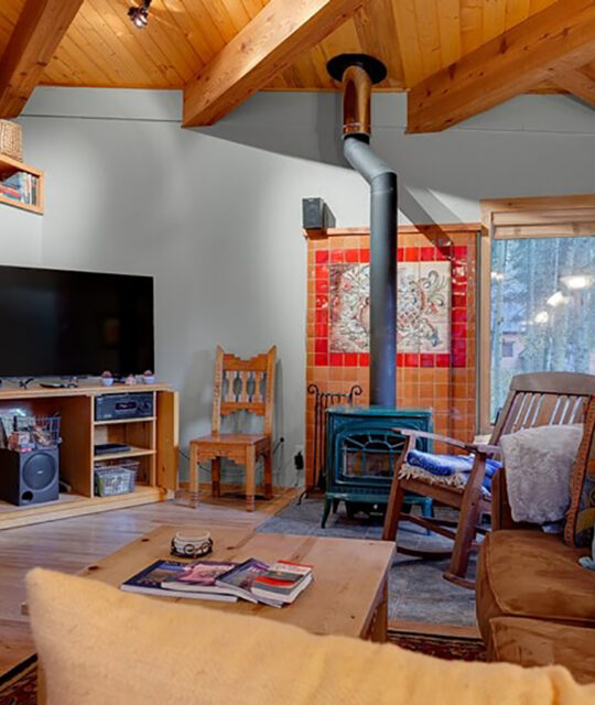 Living room of vacation rental cabin for large families in Taos Ski Valley