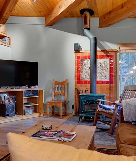 Living room of vacation rental cabin for large families in Taos Ski Valley