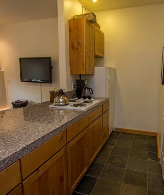 Kiva fireplace and kitchen in this new rental condo