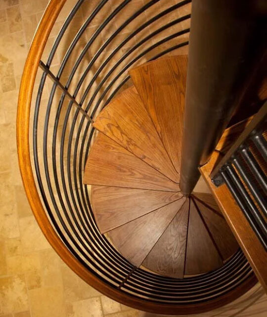 Wood spiral staircase birdseye view.