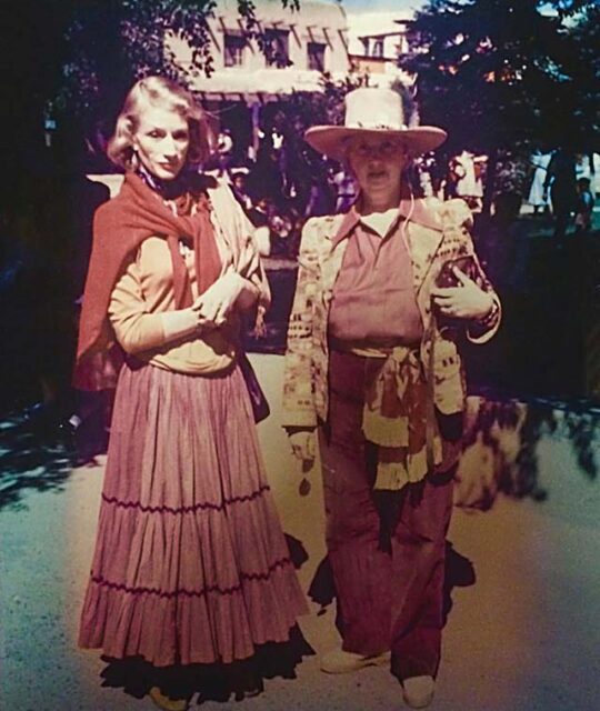 Millicent Rogers and Dorothy Brett at Taos plaza fiesta