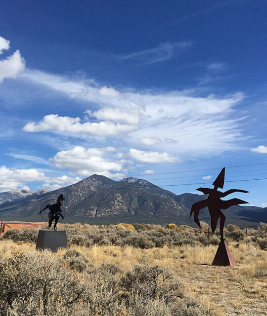 Sculpture garden with Taos Mountain backdrop