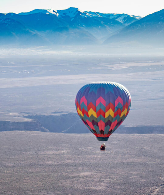 Hot air balloon with a mountain background