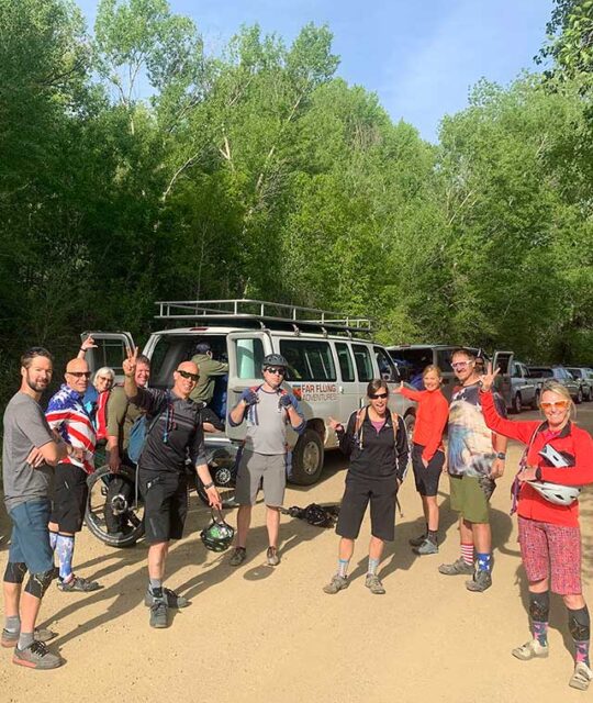 Mountain bikers taking the South Boundary mountain bike shuttle with Far Flung Adventures.