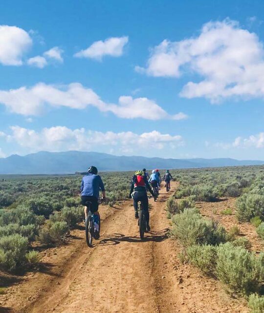 Mountain bikers enjoying the ride on West Rim trail at the Rio Grande Gorge, New Mexico