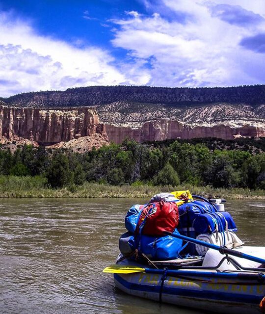 Raft loaded with camping gear