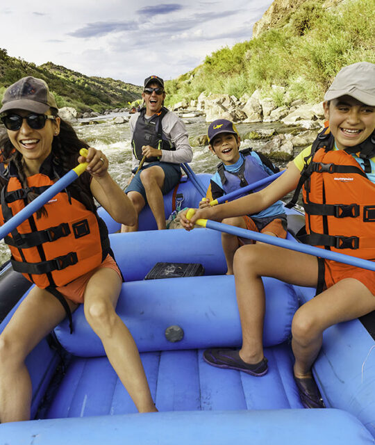 Family on guided raft trip with Far Flung Adventures on the Rio Grande Racecourse section near Pilar, New Mexico