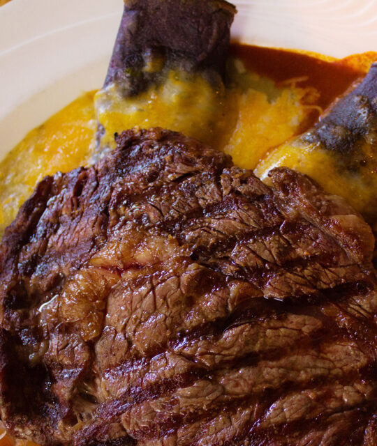 Treat yourself to a delicious steak and the full bar at Hondo Restaurant up in Taos Ski Valley