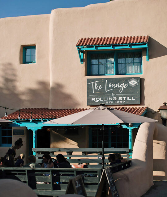 Rolling Still Lounge inviting patio on a sunny day in Taos