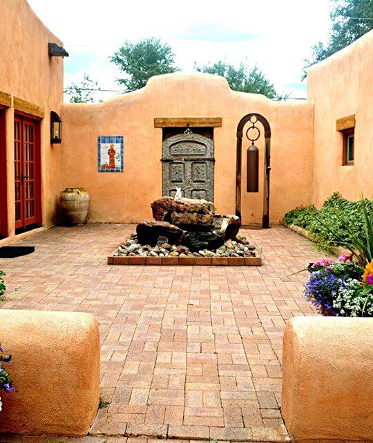 Taos adobe home courtyard