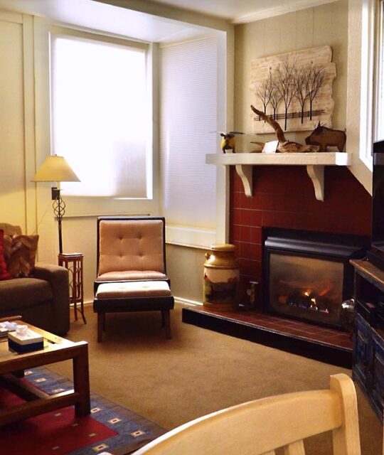 Living room and fireplace at the Rio Hondo ski condo.