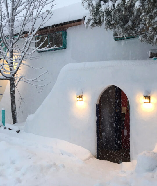 Snowmansion entrance with winter snowfall