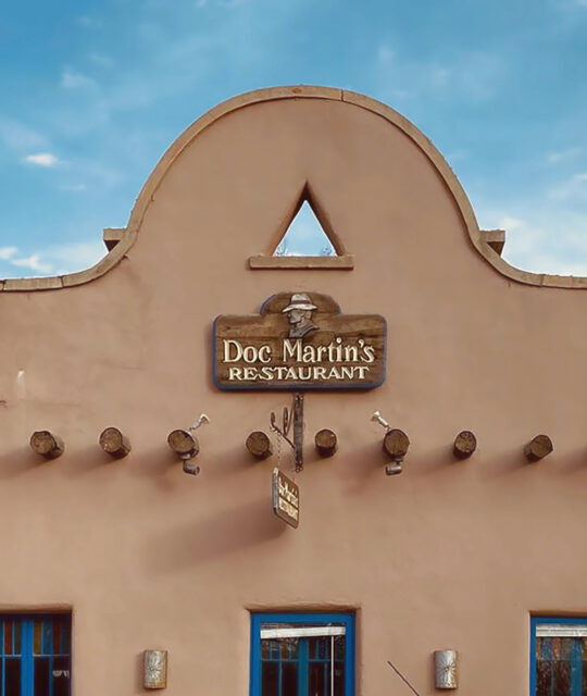 Taos Inn Doc Martin's Restaurant sign exterior adobe