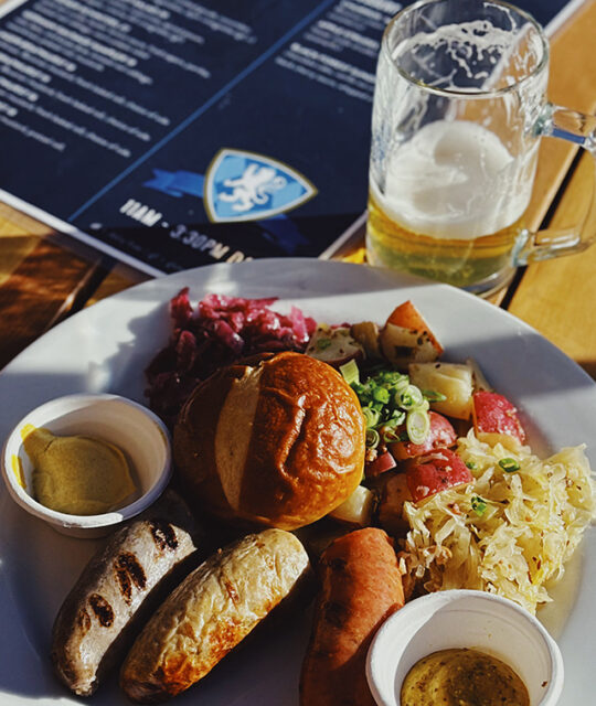 Mixed sausage plate, sauerkraut and German beer at The Bavarian.