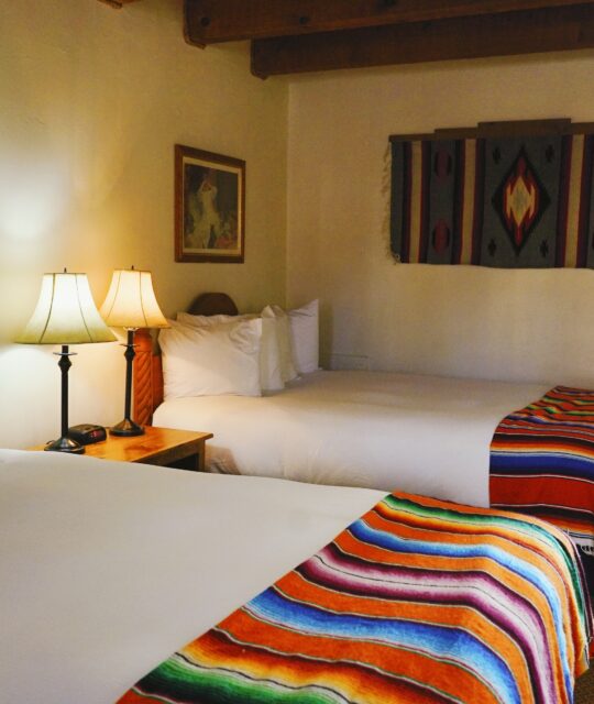 Colorful southwest bedding in cozy double bed hotel room