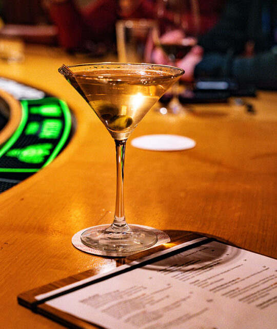 Martini on bar counter at The Blonde Bear Tavern.