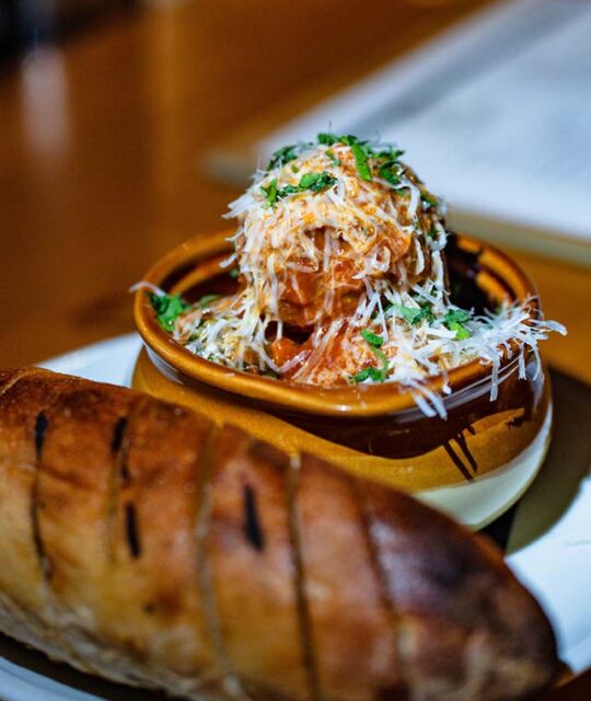 Polpette beef & pork meatballs simmered in marinara with baguette