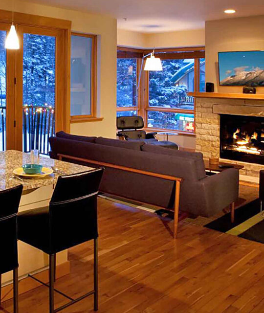 Living room and fireplace ski condo