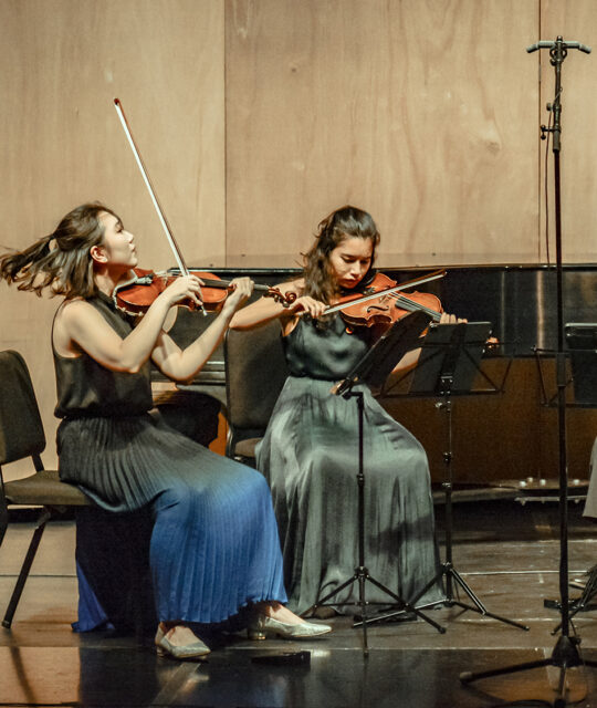 Young women chamber music violinists