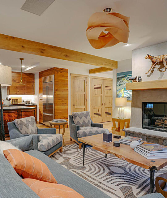 A penthouse living dining area at The Blake hotel in Taos Ski Valley