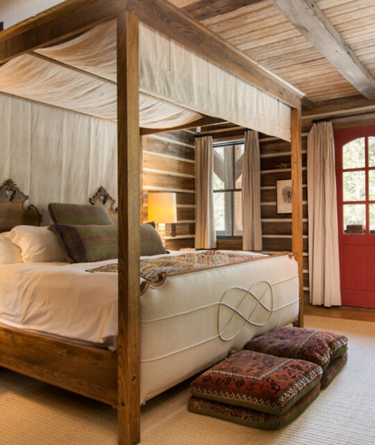 Unique poster bed in a mountain cabin