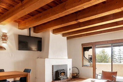 Sunny living area with southwest style fireplace