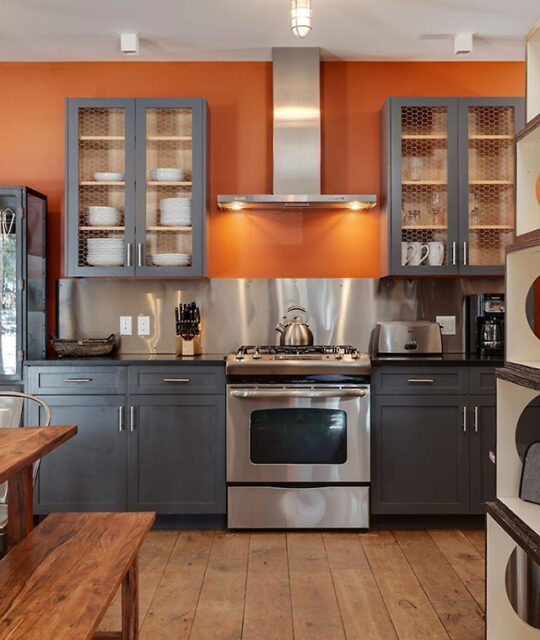 Modern rustic kitchen with orange and grey accents