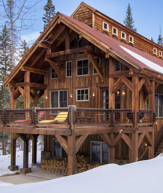 Large family vacation cabin set in snowy mountains offered with M Vacation Properties.