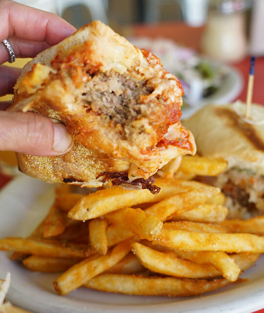 Meatball sandwich and fries.