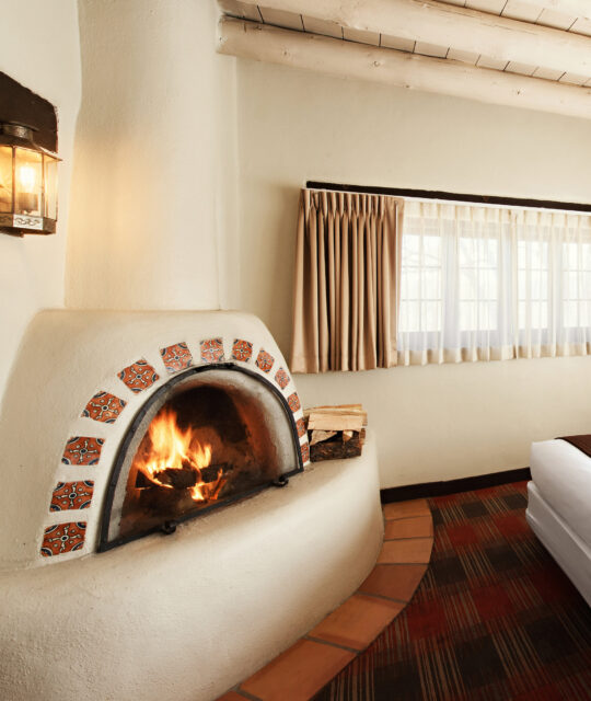 Hotel room with Pueblo kiva fireplace