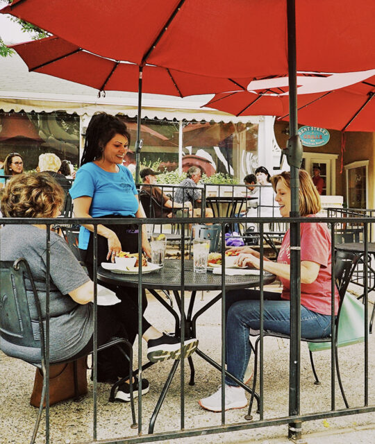 Outdoor dining patio scene at Bent Street Grille in Taos